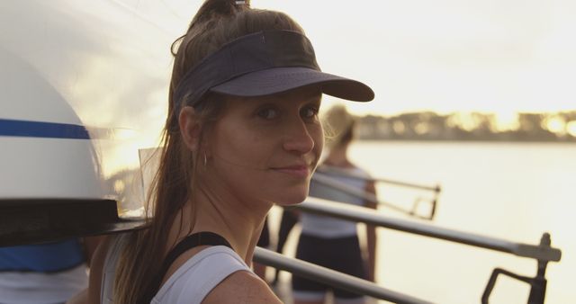 Female Rowing Team Preparing Boat for Early Morning Practice - Download Free Stock Images Pikwizard.com