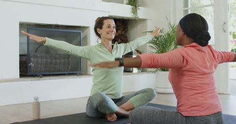 Diverse Women Enjoying Yoga at Home for Balance and Relaxation