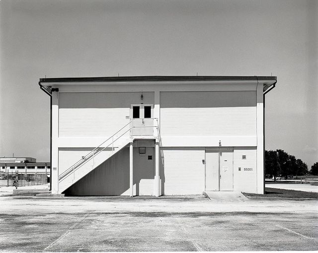 Exterior View of Minimalist Warehouse Annex on Clear Day - Download Free Stock Images Pikwizard.com