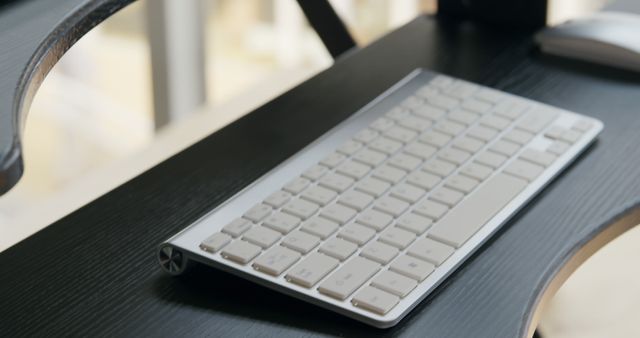 Close-Up of Wireless Keyboard on Modern Office Desk - Download Free Stock Photos Pikwizard.com