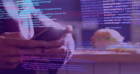 Adult Hands Holding Smartphone While Scrolling with Overlayed Code in Purple Tech Workspace
