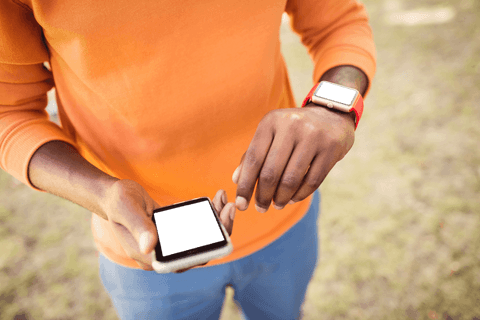 man with transparent device screens wearing orange in open field - Download Free Stock Videos Pikwizard.com