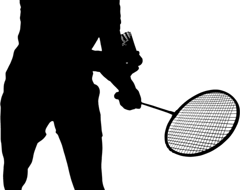 Transparent silhouette of male badminton player on black