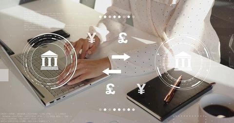 Woman in Polka Dot Blouse Typing on Laptop with Digital Currency Symbols