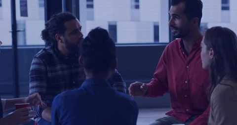 Colleagues Sharing Creative Ideas in Modern Office Environment