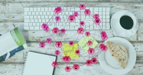 Digital Connections Network Over Office Desk with Coffee and Pastry