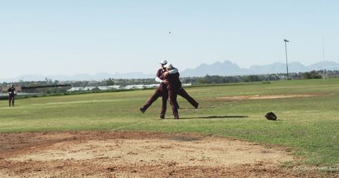 Baseball Players Celebrating Victory on Pitcher's Mound