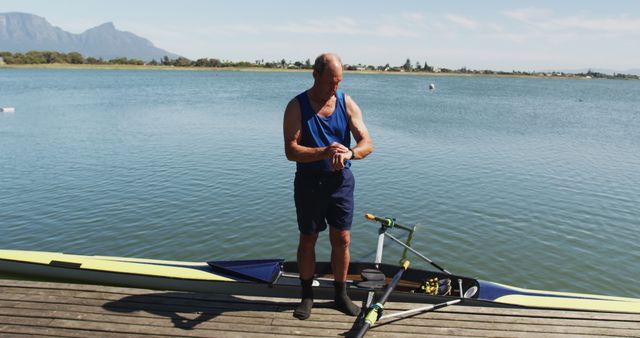 Senior Man Preparing for Kayaking on Sunny Day - Download Free Stock Images Pikwizard.com