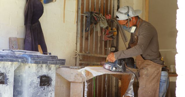 Craftsman Using Electric Sander in Workshop - Download Free Stock Images Pikwizard.com