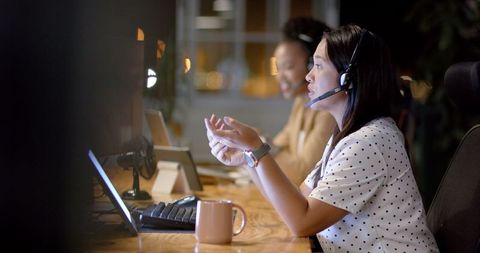 Late night office team senagaging in collaborative planning