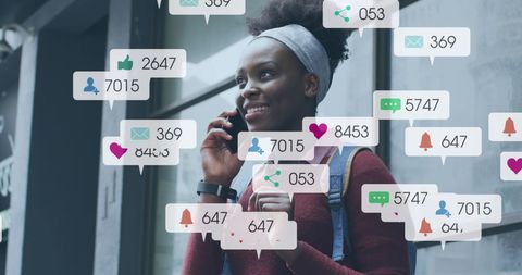 Engaged African American Woman Surrounded by Social Media Interaction Icons