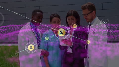Diverse Medical Team Engaged with Digital Network Interface