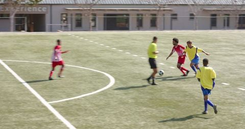 Intense Soccer Match Capturing Youth Teamwork and Competition