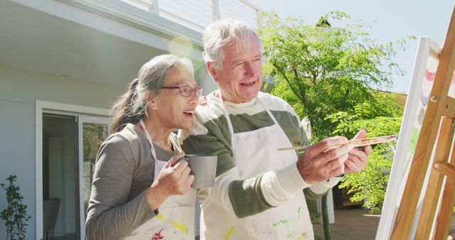 Senior Couple Enjoying Painting Outdoors on a Sunny Day - Download Free Stock Images Pikwizard.com