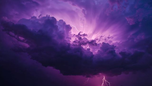 Dramatic lightning in majestic purple thunderstorm sky