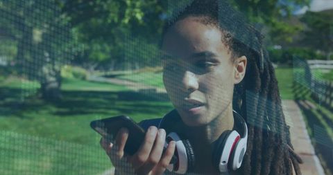Woman Engaged in Futuristic Communication with Smartphone