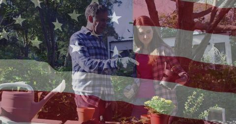Father and Daughter Enjoy Gardening Time Together Outdoors