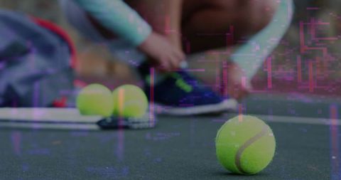 Athlete Preparing for Tennis Match on Outdoor Court