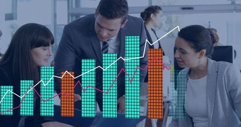 Business team analyzing market data and collaborating over laptop with analytics charts