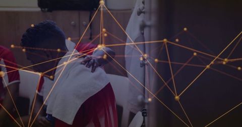 Athletes Showing Support in Locker Room with Digital Network Overlay