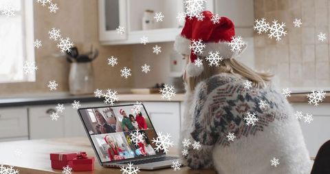 Festive Online Celebration with Santa Hat and Snowflakes