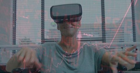 Senior woman exploring virtual finance dashboard with VR headset interacting with charts
