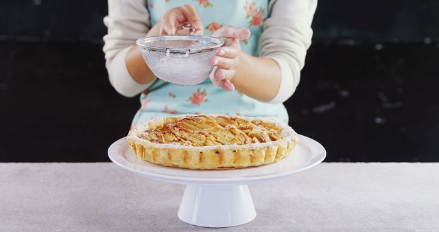 Baker Sprinkling Powdered Sugar on Homemade Apple Pie - Download Free Stock Images Pikwizard.com