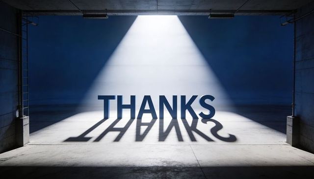 Dramatic Spotlight on Bold THANKS Typography Casting Long Shadow on Blue Concrete Floor