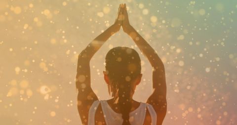 Peaceful Caucasian Woman Practicing Yoga Amid Glittering Light - Download Free Stock Images Pikwizard.com