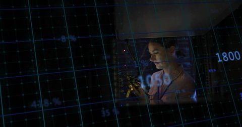 Technician Adjusting Server Rack with Digital Data Overlay