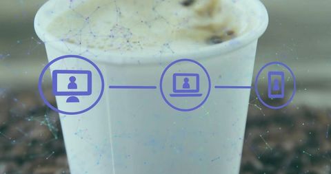 Paper coffee cup showing digital device connection icons overlay remote work collaboration