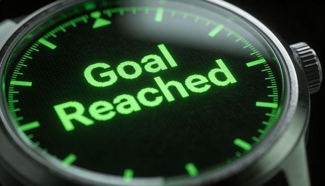 Smartwatch glowing neon-green 'goal reached' display close-up on curved glass dial