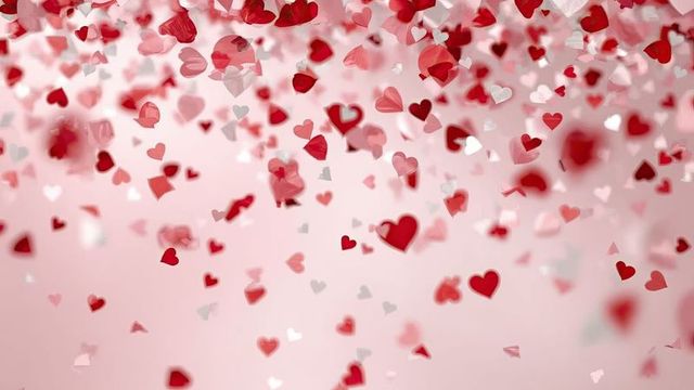 Floating Heart Confetti on Soft Pink Gradient for Romantic Occasions