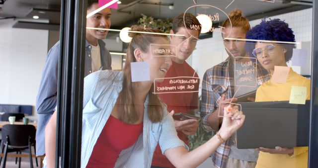 Team Collaborating on Glass Board for Creative Brainstorming - Download Free Stock Images Pikwizard.com