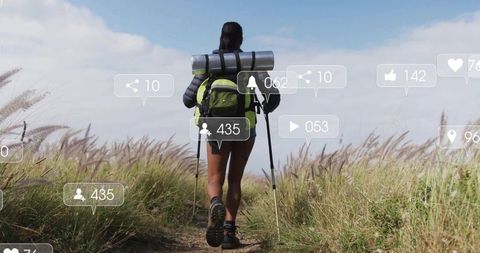 Female Hiker with AR Icons on a Scenic Outdoor Trail