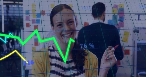Team analyzing data with innovative digital interface in modern office