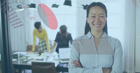 Asian Businesswoman Connecting with Data Analytics in Office