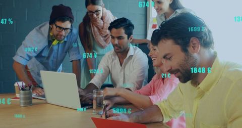 Diverse Team Analyzing Global Financial Trends in Modern Office