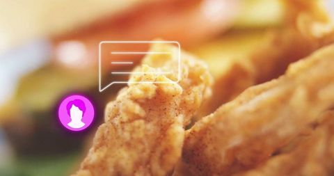 Crispy fried chicken pieces with garnish and icons