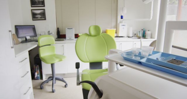 Modern Empty Dental Clinic with Green Chair and Equipment - Download Free Stock Images Pikwizard.com