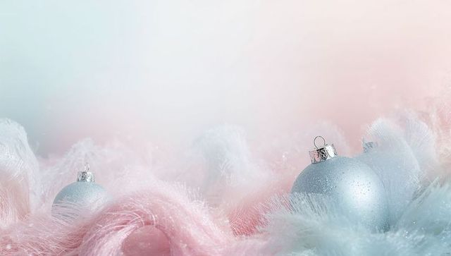 Silver-blue baubles nestling on pastel pink and blue faux fur with glitter