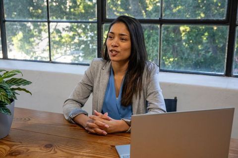 Asian Businesswoman in Minimalistic Office Environment