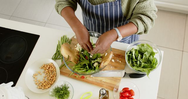 Senior Woman Preparing Fresh Salad with Organic Vegetables - Download Free Stock Images Pikwizard.com