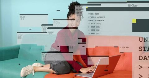 Typing on laptop, relaxing on two-tone sofa with futuristic glitch ui overlay