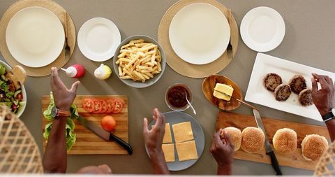 Preparing Homemade Burgers and Fries for Family Dinner