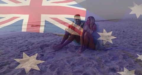Couple embracing on sunset beach with australian flag overlay for travel romance