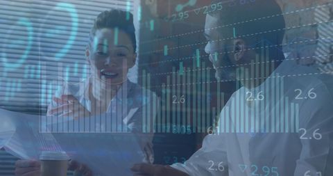 Diverse professionals analyzing financial data with digital graphics overlay