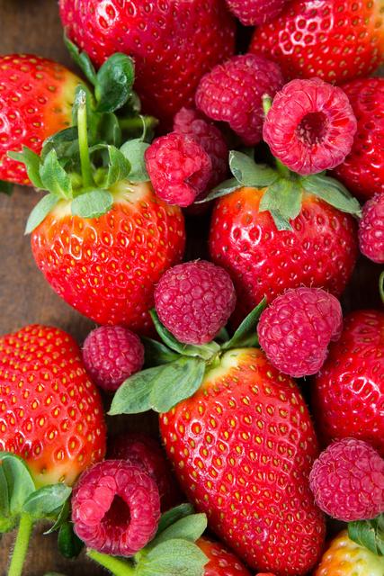 Close-up of fresh strawberries and raspberries