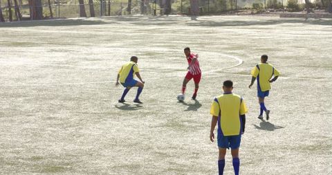 Intense Soccer Game in Bright Daylight