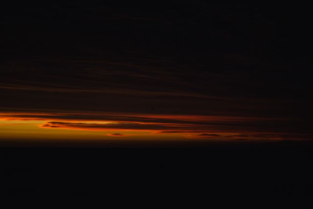Dramatic Dark Sunset with Orange and Red Sky - Download Free Stock Photos Pikwizard.com